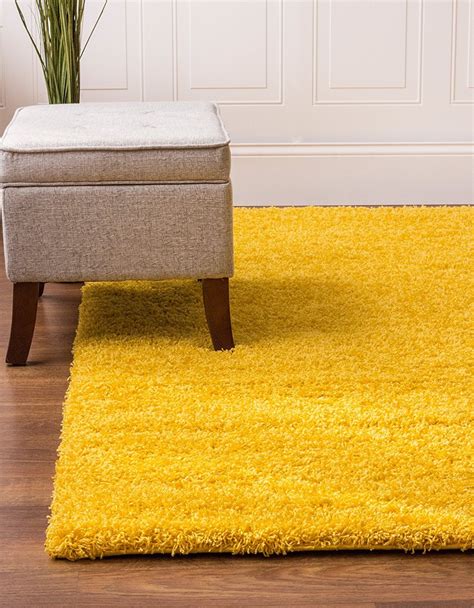 It's also prevalent in clothes and other fashion, and it isn't going anywhere soon. . Mustard yellow area rug